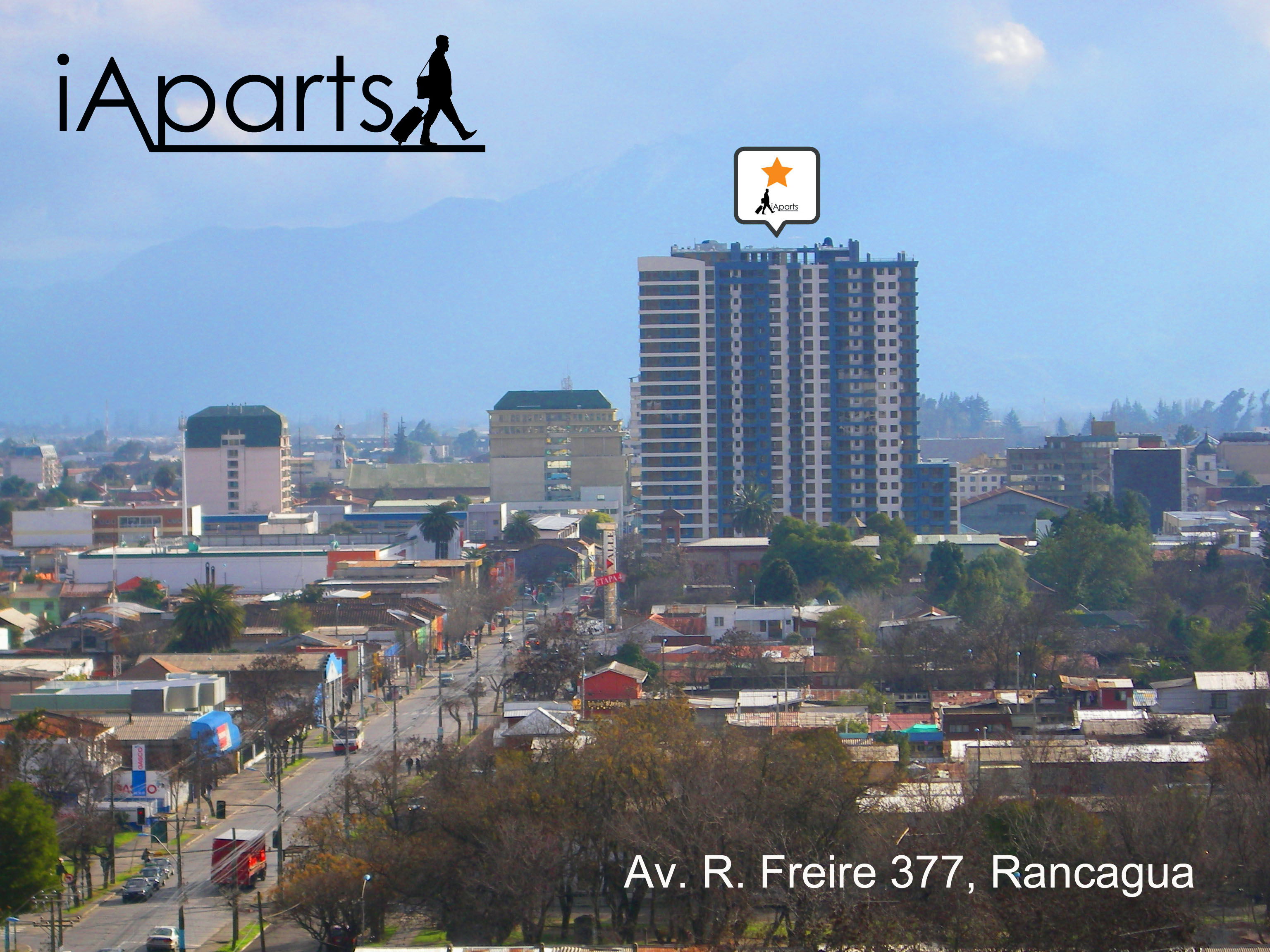 Centro de la ciudad de Rancagua. Edificio Panoramic rodeado de otros edificios del centro y logo de iAparts a la derecha.

